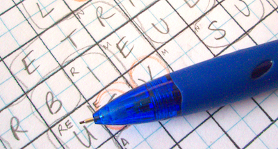 Close up of a word search puzzle and a pencil